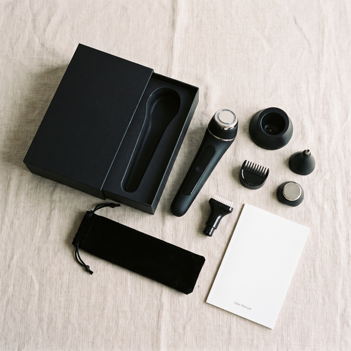 Black skin massage device packaging flat lay for home spa use