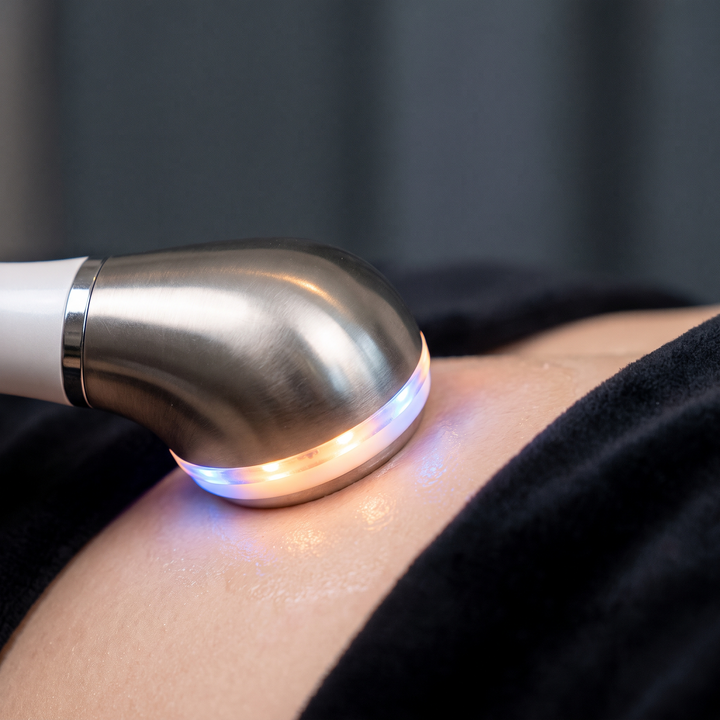 Skin massage device LED light therapy mode glow