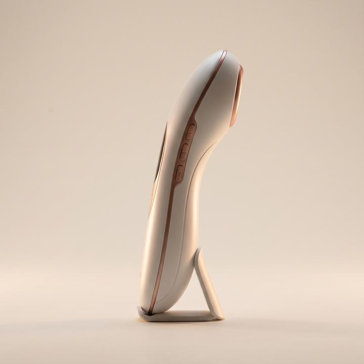 Side profile of professional-grade skin massage device showing ergonomic design