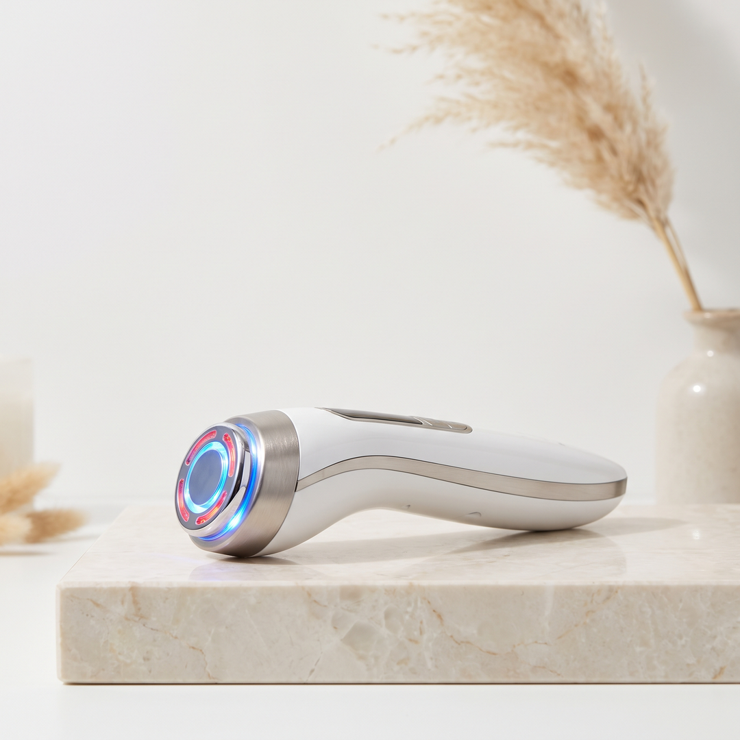 White professional-grade skin massage device with radiofrequency and LED light, elegant spa product photography