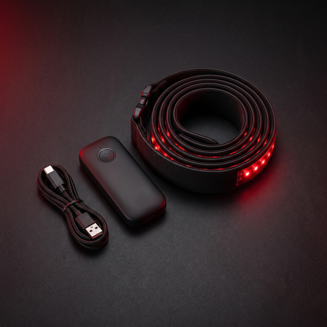 PHYSIOATHLETX Red Light Recovery Belt - coiled flat lay with controller