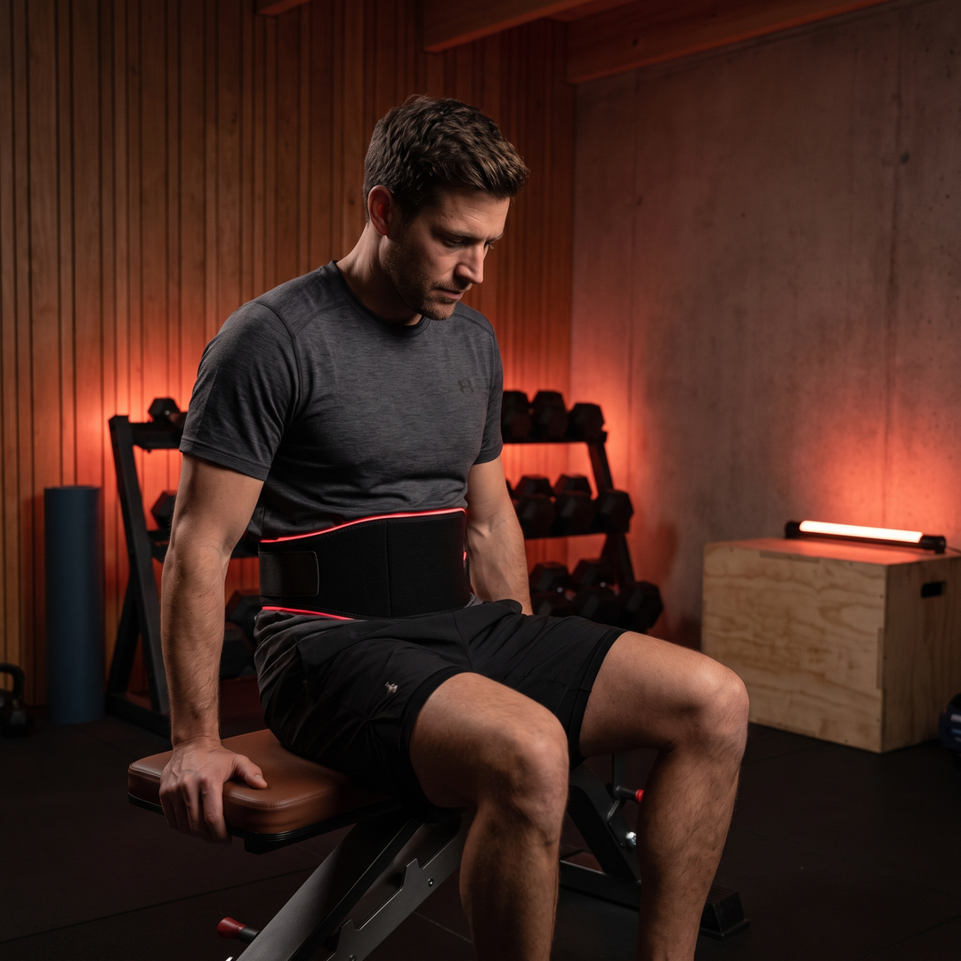PHYSIOATHLETX Red Light Recovery Belt - worn during post-workout wind-down
