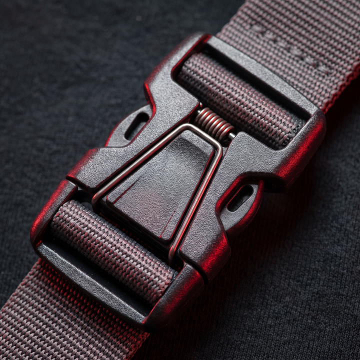 Closure buckle detail on adjustable shoulder support strap