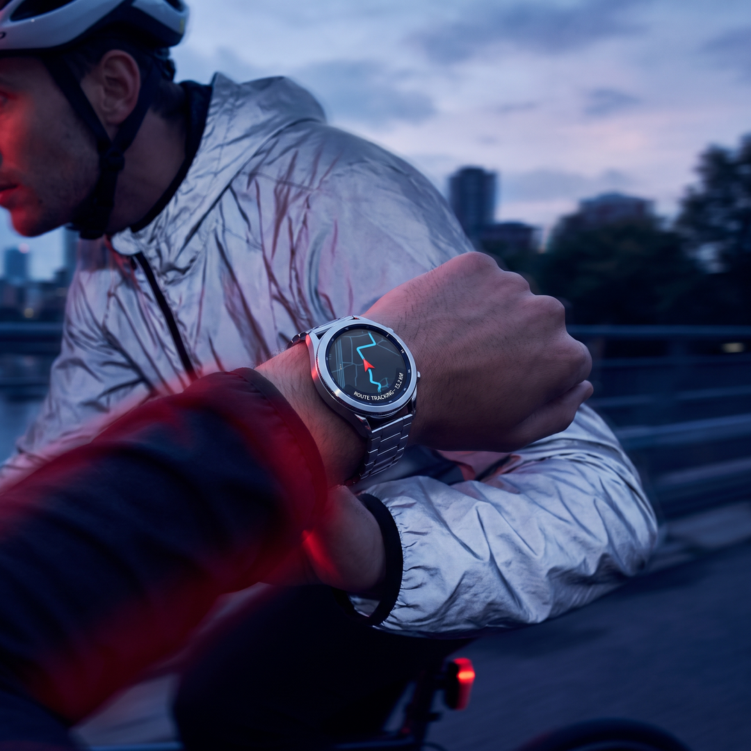 Cyclist wearing PHYSIOATHLETX Smart Watch with GPS route tracking