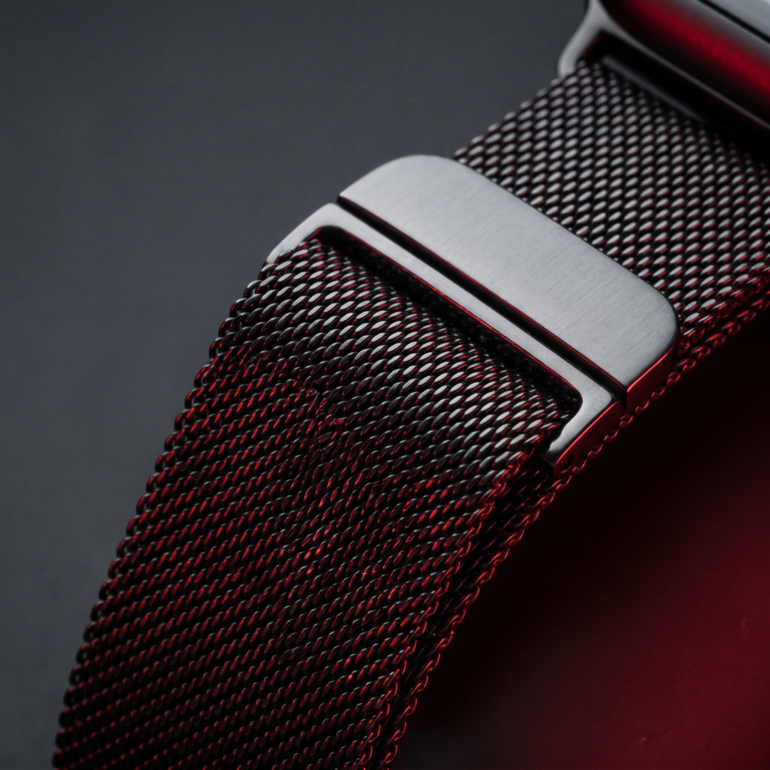 Black mesh milanese loop band close-up on PHYSIOATHLETX Smart Watch