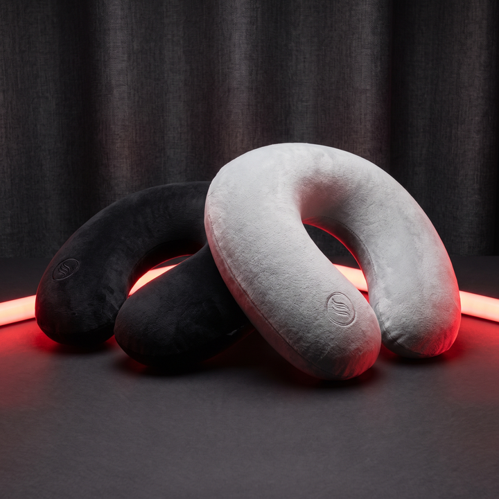 Black and light grey travel neck pillow colorways displayed together