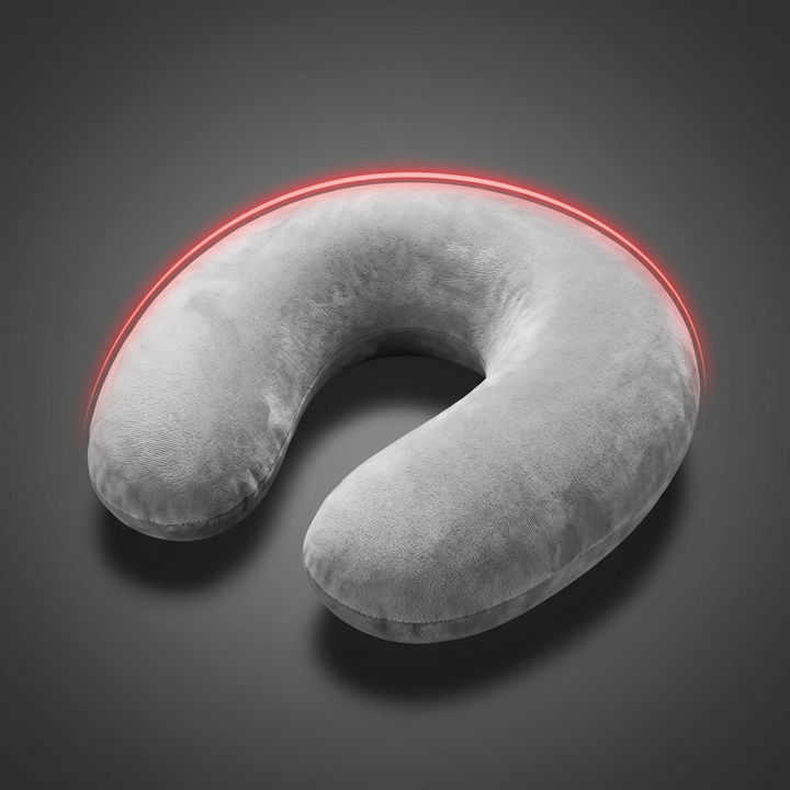 Light grey memory foam travel neck pillow at an angle showing ergonomic U-shaped support