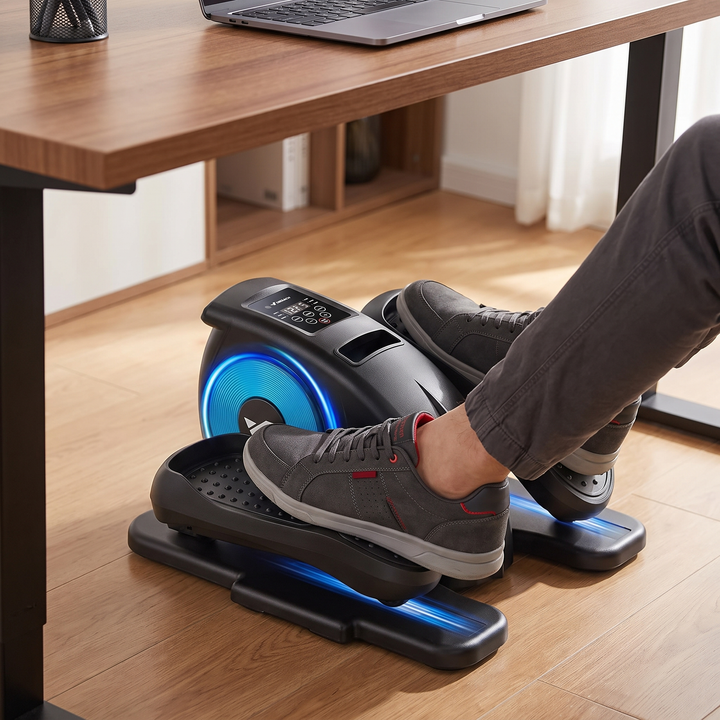 PHYSIOATHLETX Under Desk Elliptical Machine close-up of feet on pedals