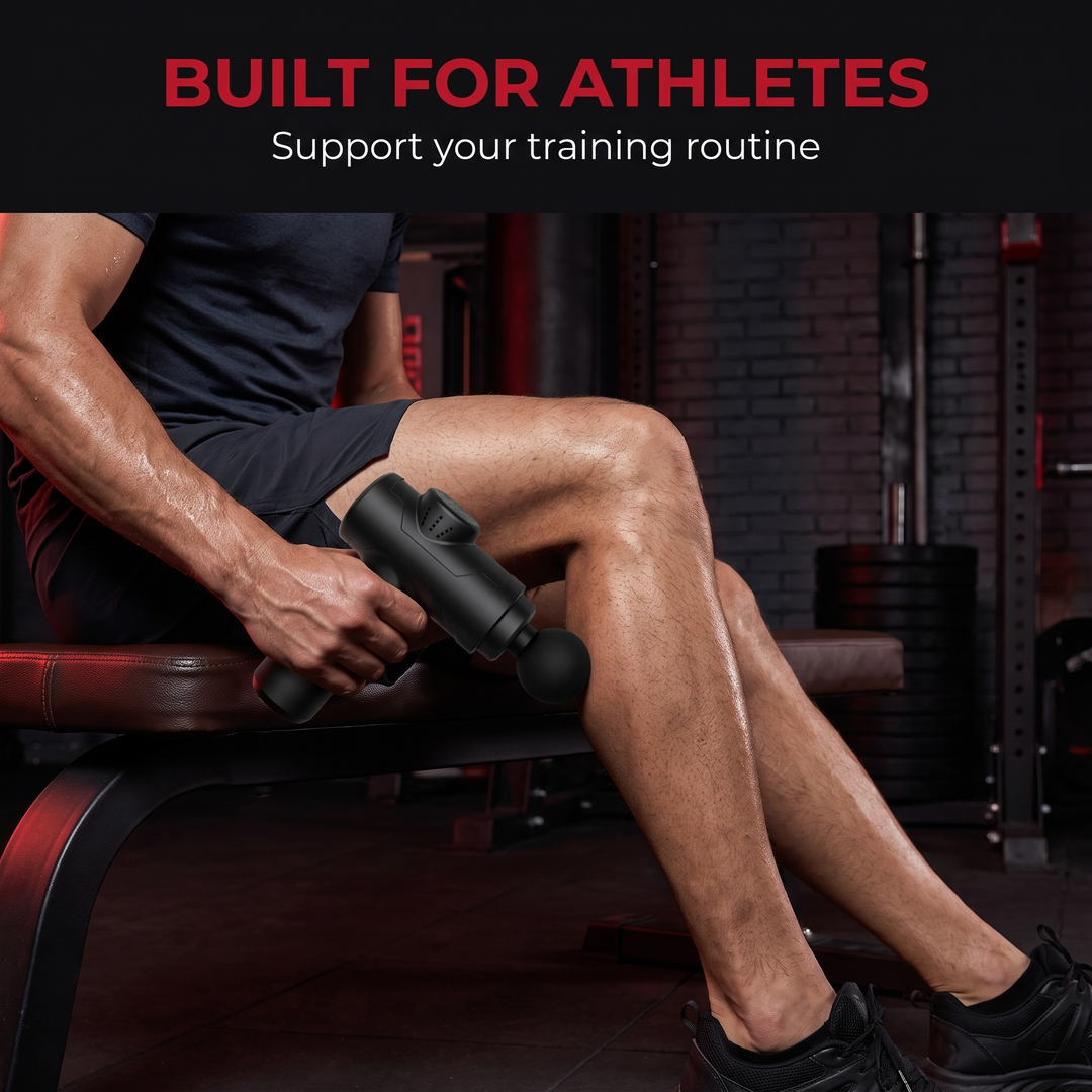 Massage gun built for athletes, calf recovery on gym bench