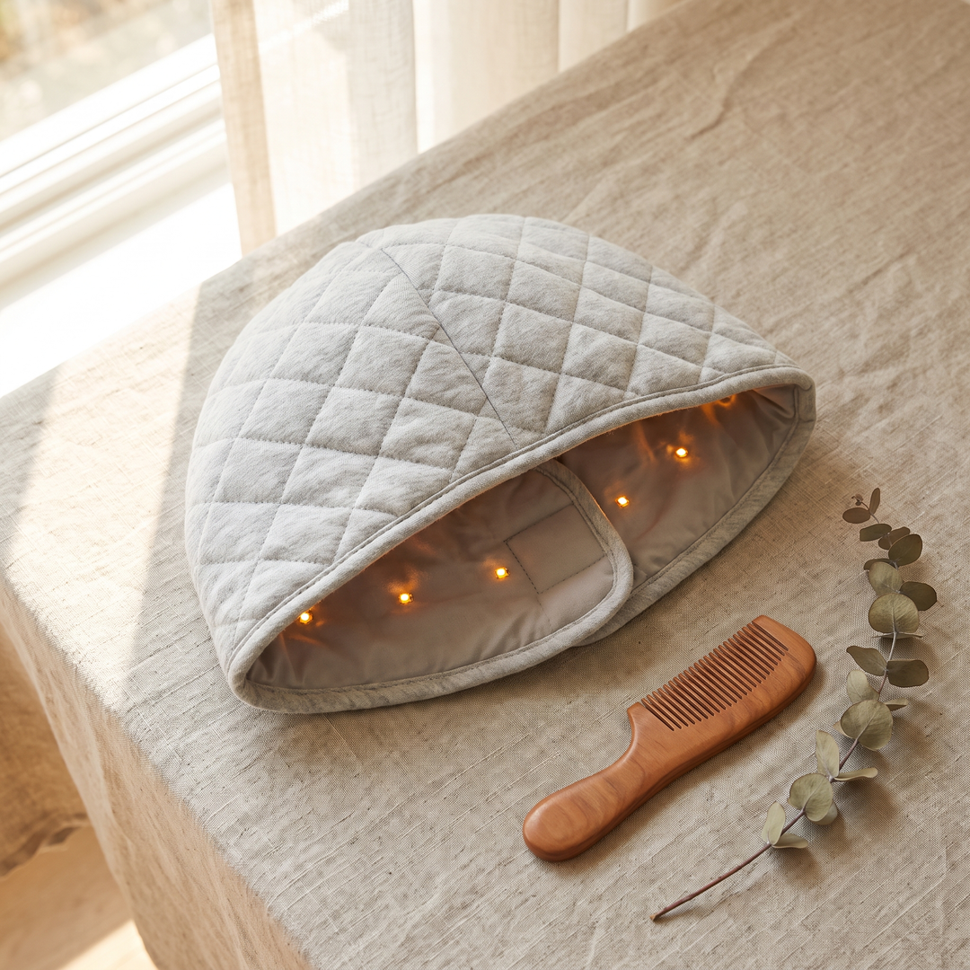 Grey LED scalp care cap top-down view