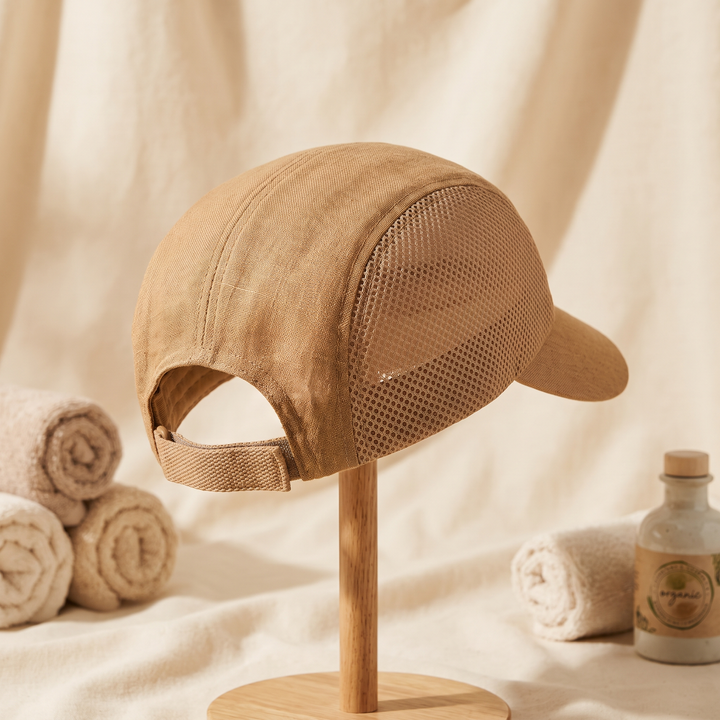 Multifunctional LED scalp care cap side view showing adjustable strap and mesh panel