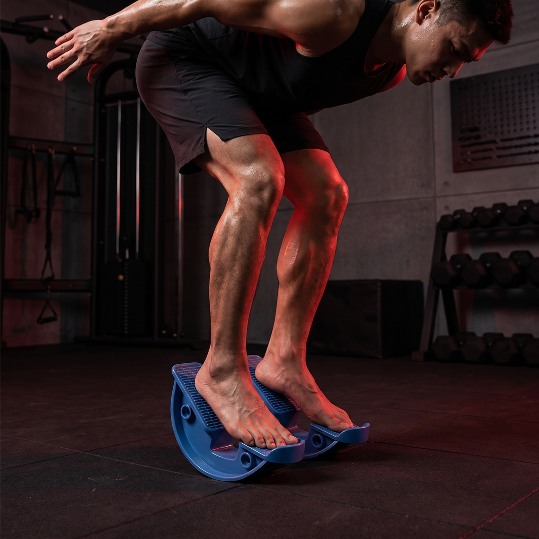 Blue stretching wheel calf stretcher, balance and stability training lifestyle shot