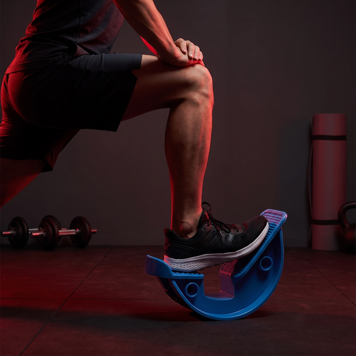 Blue stretching wheel calf stretcher, calf stretch on pedal lifestyle shot