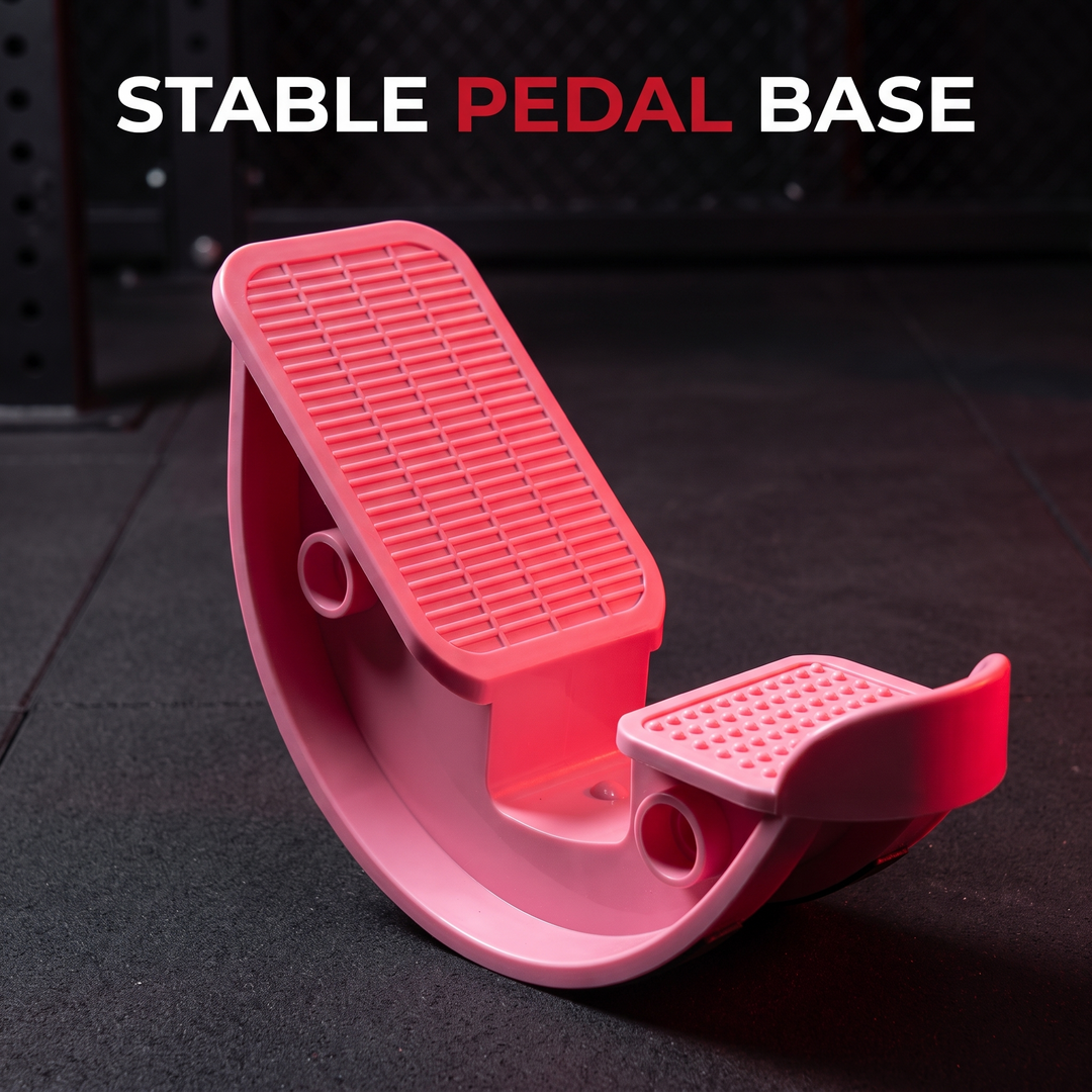 Pink stretching wheel calf stretcher, stable pedal base close-up