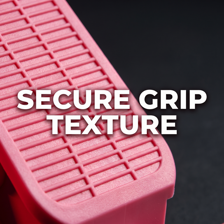 Pink stretching wheel calf stretcher, secure grip texture macro detail