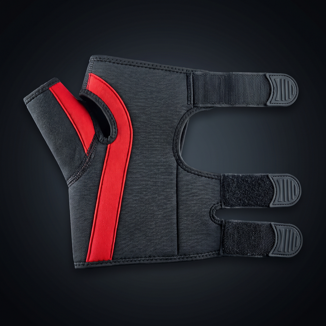 Adjustable wrist support brace, right-hand front view, dark charcoal with red accent
